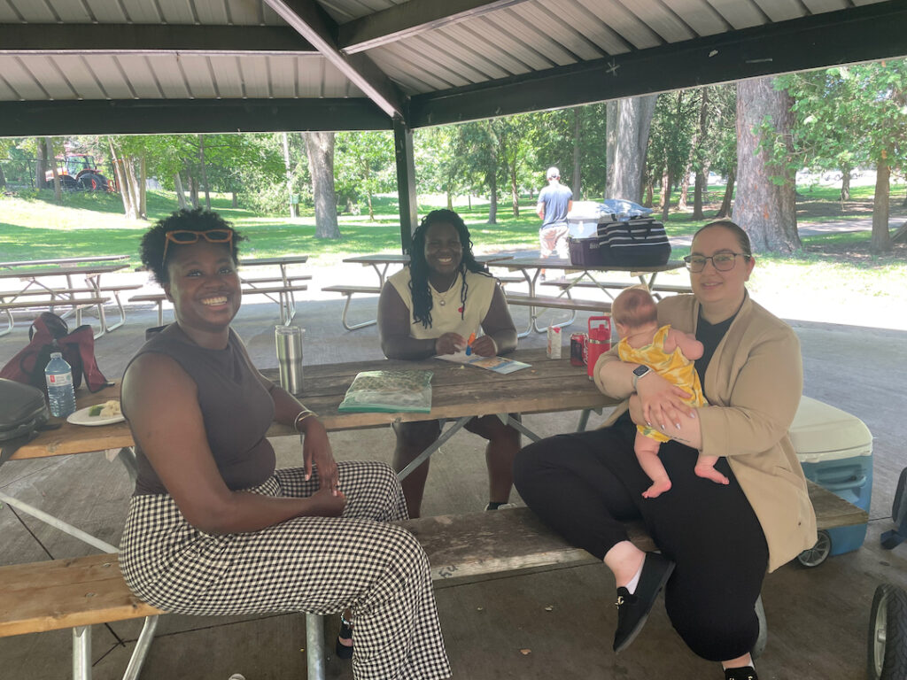 Kamaria, Bri and Sarah at the picnic with Karlas baby
