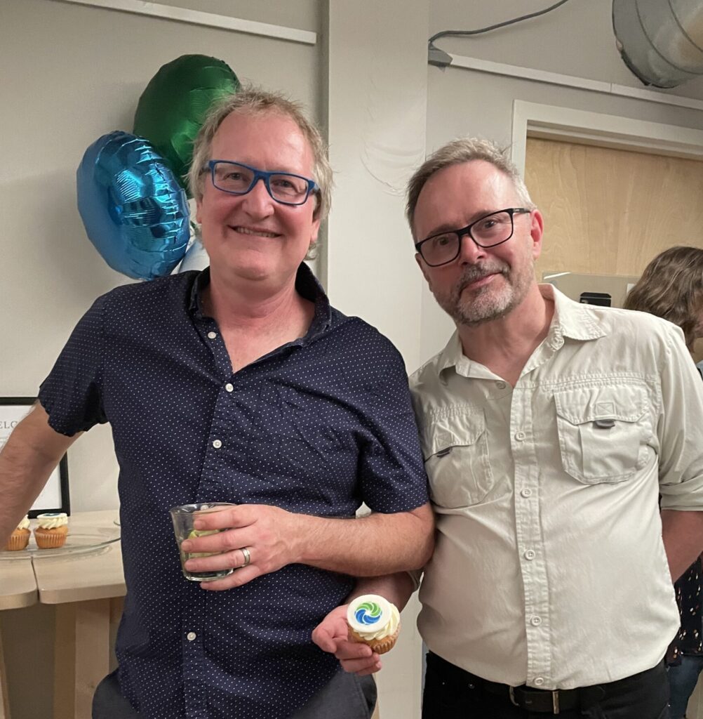 Jason and Andrew Jason and Andrew at the TNC anniversary party, Andrew is holding a cupcake with the TNC logo on it